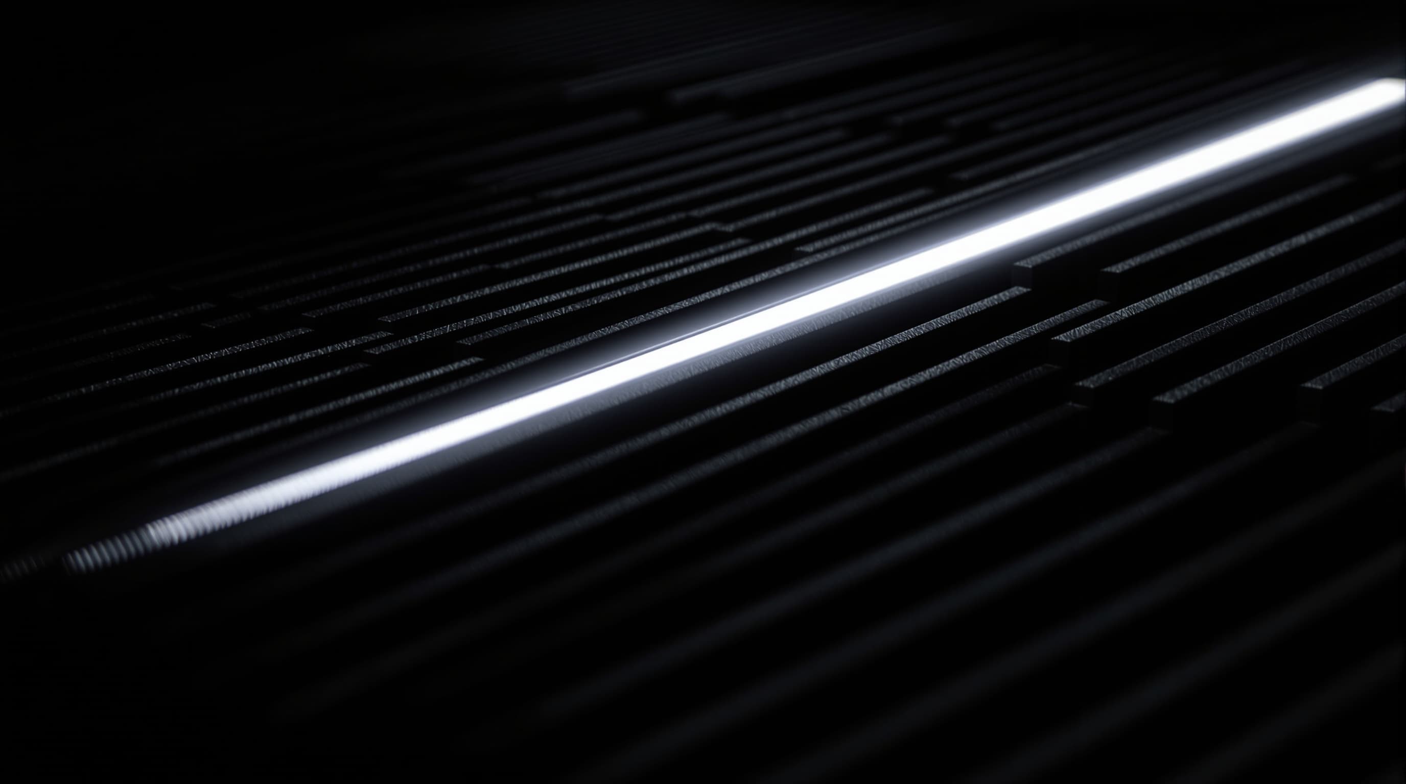 Macro photograph of a black anodised heatsink fin array